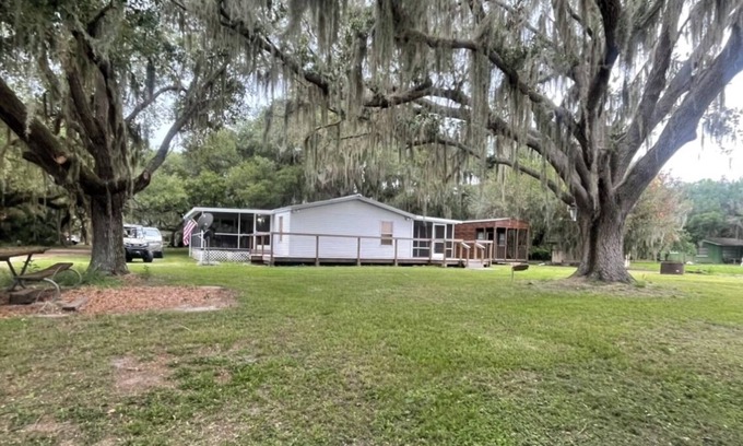 River Ranch House | 3 bedroom, 2 bath on Lake Kissimmee canal with boat dock and trailer parking.