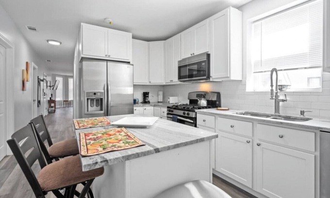 Greater Grand Crossing Apartment | 3 BR w Private Parking Minutes from I-90