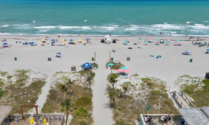 Cocoa Beach House | 3BR Downtown Sleeps 8 Rooftop Patio Grand Piano Walk to Beach & Downtown