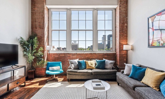 Crossroads Arts District Apartment | 3BR Stunning Downtown Historic Loft with Gym