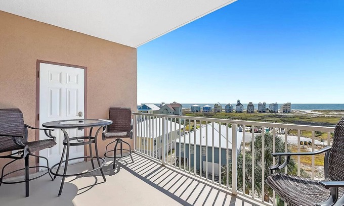 Fort Morgan Condo | 4 minute walk to beach & gulf views from private balcony!