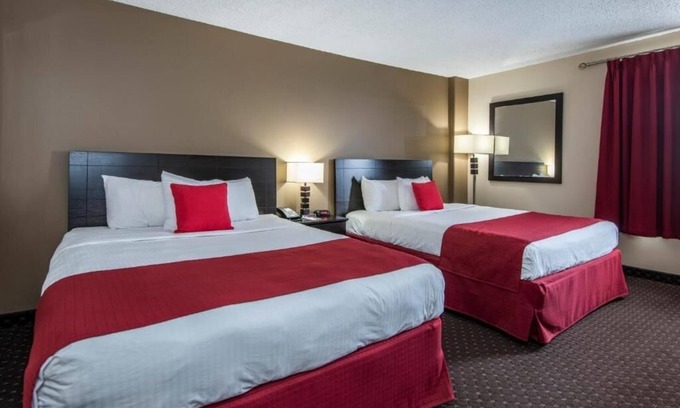 Grande Prairie Hotel | 4 Spacious Rooms Near Philip J Currie Dinosaur Museum, Just 20 Min Away