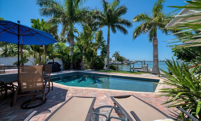 Indian Rocks Beach House | 456 Waterfront w/Dock, 3/Br Home Heated pool with Golf Cart in IRB Sleeps 10