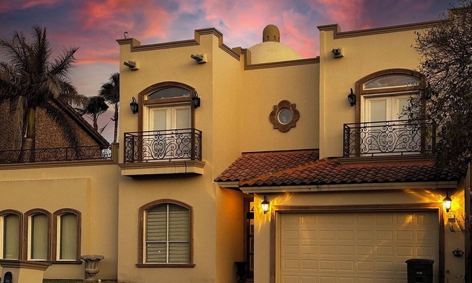 Mission House | 4BR Hacienda Lakeview Retreat: Pool, Fireplace, Piano + Theater Room