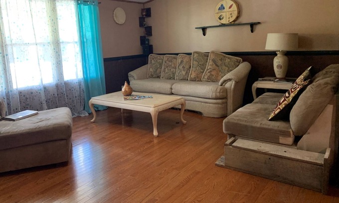 Roxboro House | 5 bdrm, 3 full bth, large living room and fireplace area.