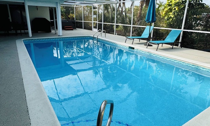 Caloosahatchee House | 5 Bedroom Pool Home Hot Tub Gulf Access Game Room Cape Coral Pets Welcome