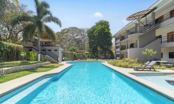 Coco Condo | 5-minute Walk to Beach & Town - Gated - Pool & BBQ