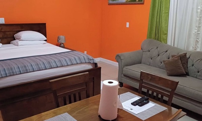 Leeward Settlement Apartment | 55 Oasis Cottage. Studio suite. Nearby World's #1 Grace Bay Beach.