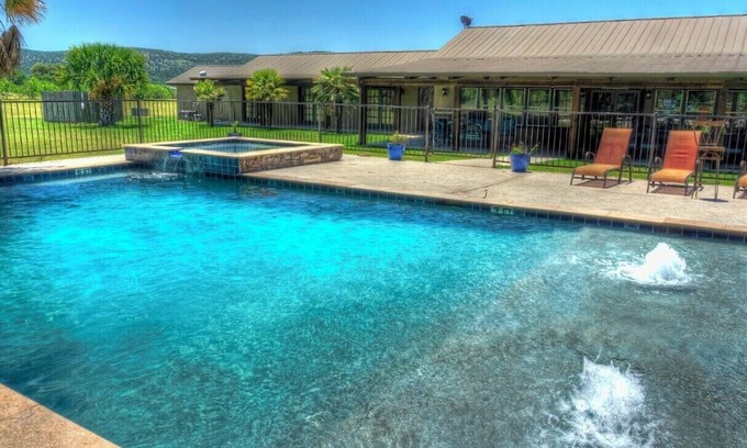 Sabinal Cabin | 6-bedroom Lodge on 12 acres in Concan, Texas. Swimming pool & hot tub.