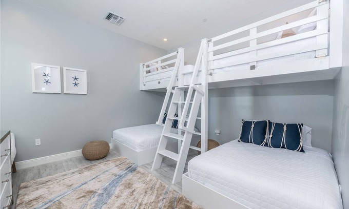 West Bay Condo | 7 Mile Beach Beach Penthouse. Ocean views from Roof Terrace and a Pool Pavilion