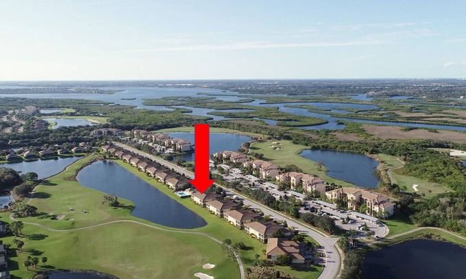 Braden River House | 8304-102 Gorgeous golf and lake view coach home next to pool
