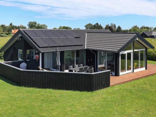 Tørresø House | 9 person holiday home in Otterup-By Traum