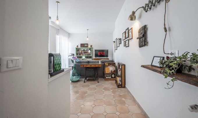 Old Town Apartment | [A BALCONY OVER THE ROOFTOPS OF MODENA] FROM THE BRUNETTE