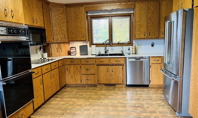Elkhart Lake House | A-Frame lodge on 40 acres in Elkhart Lake, WI. walk to town. Sleeps 10