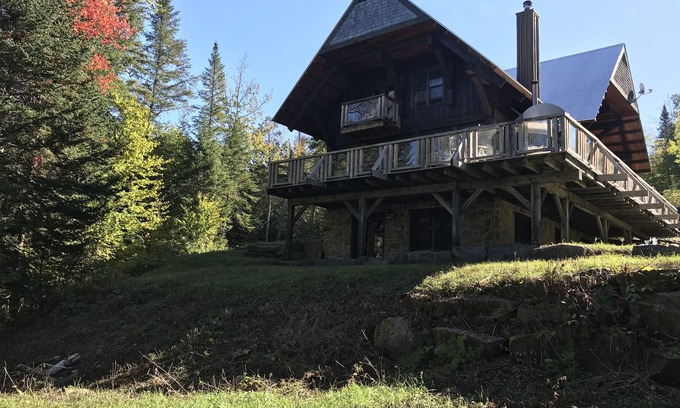 Lac-Superieur Ski Chalet | A large & cozy cabin with private spa and fireplace by Mont Tremblant