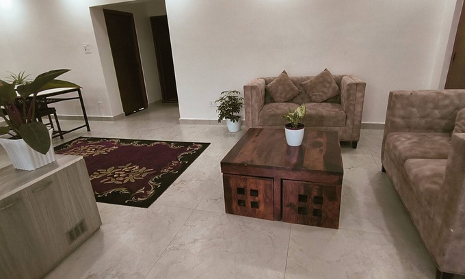 Bharatpur House | A two-bedroom home with a living room, kitchen, and garden feels like home.n