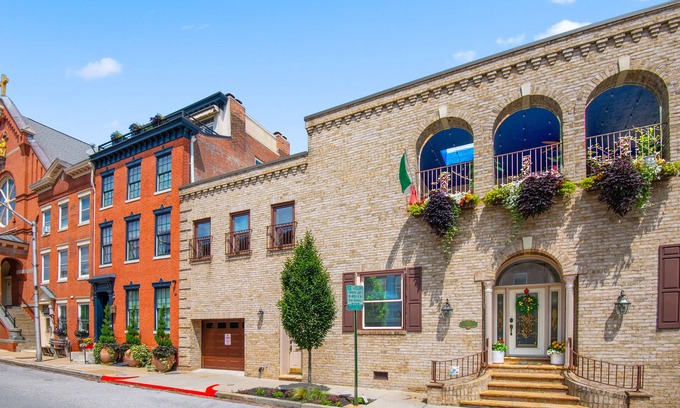 Downtown Baltimore Villa | A Villa Steps from Harbor East with Indoor Pool and 4-Car Parking Sleeps 12