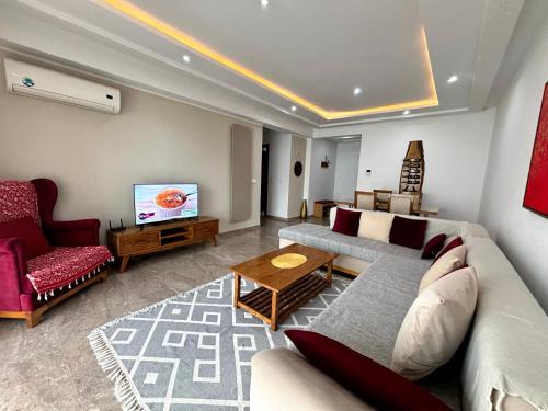 El Bassatine Apartment | Abilia Suite - À Proximité de l'Aéroport - Confort et Élégance