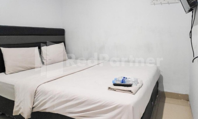 Perbaugan Hotel | Ada Guest House Medan Redpartner