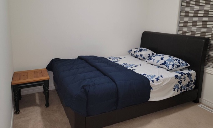 Brampton House | Adig comfortable Bedroom in Brampton .