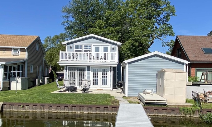 Manitou Beach-Devils Lake House | Airy, updated family cottage on all-sports lake
