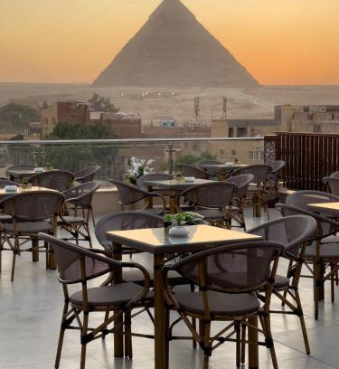 Kafrat al Jabal Hotel | AKHNATON Pyramids View Hotel With Rooftop Access & free airport pickup