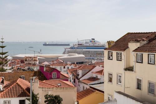 Santo Estevao Apartment | Alfama Terrace Best River and Historic City View Spacious and Charming Ground Floor 18th Century Building