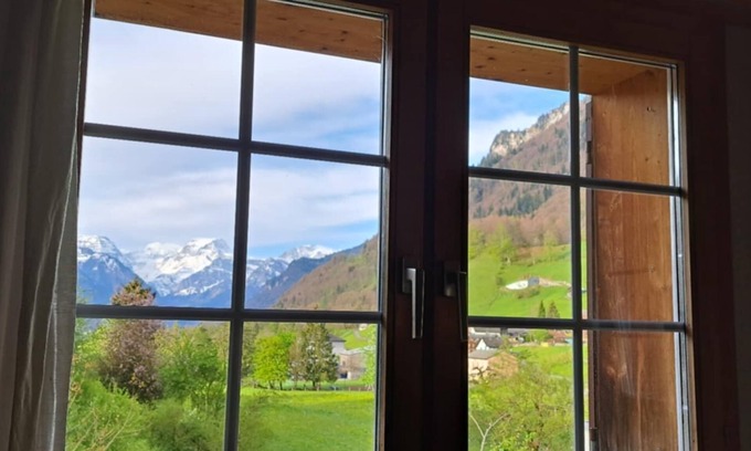 Schwanden House | Alpine Chalet with Mountain Views & Tranquillity