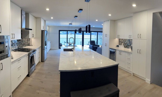 Central Okanagan House | Amazing private lakeside home with beach and private dock