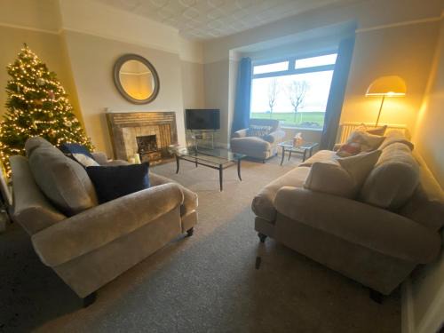 Nairn House | Amazing views across the Moray Firth, Private Suntrap Patio, 300m from the Beach, off street parking!