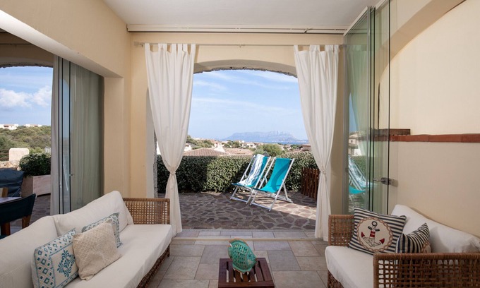 Pittulongu Apartment | Anemone Apartment with Terrace by Wonderful Italy