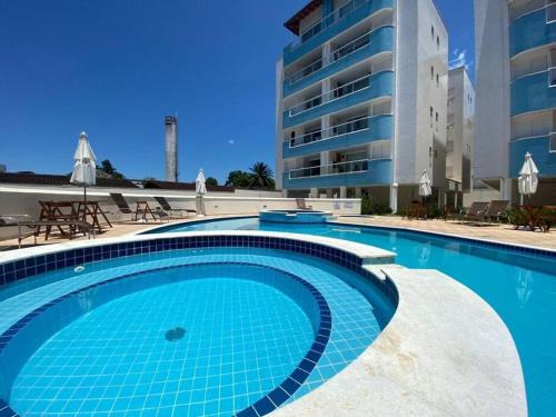 Praia da Enseada Apartment | Apartamento 23A para 6 pessoas com Piscina e Churrasqueira no Cond Torremolinos Beach a 80m para Pé na areia na Praia da Enseada Ubatuba