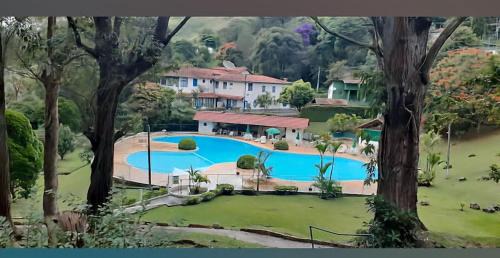 Cascata do Imbui Apartment | Apartamento Cond Vale do Sol - Hotel em Petrópolis - Itaipava Piscina Cinematográfica