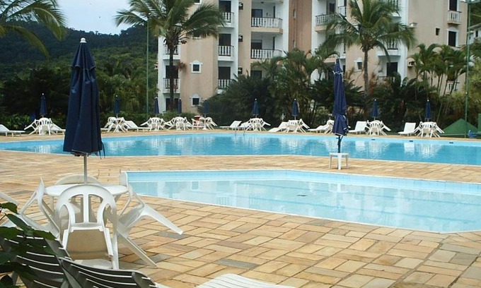 Toninhas Apartment | Apartamento Condomínio Wembley Tênis - Toninhas - Ubatuba - SP