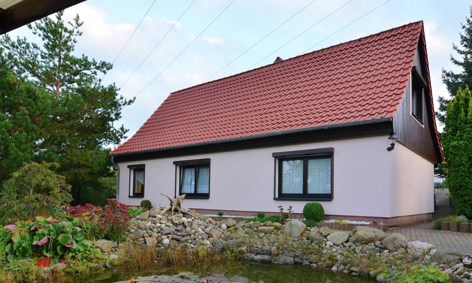 Wienrode Apartment | Apartment in the Harz with a log cabin, pond and covered seating area