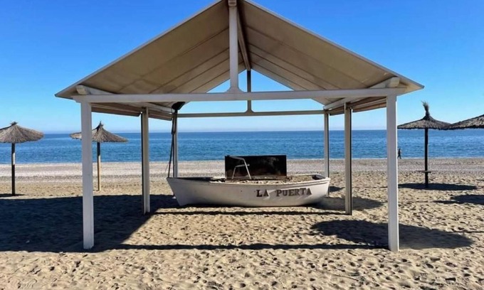San Luis de Sabinillas Apartment | Apartment 'Sabinillas Front Line Beach' with Shared Pool, Wi-Fi and Air Conditioning