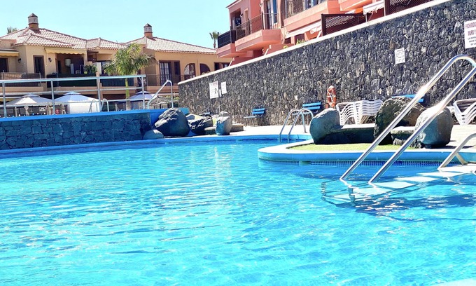 Arona Apartment | Apartment 2 Steps from the Sea with Air Conditioning, Relaxing Terrace and Pool