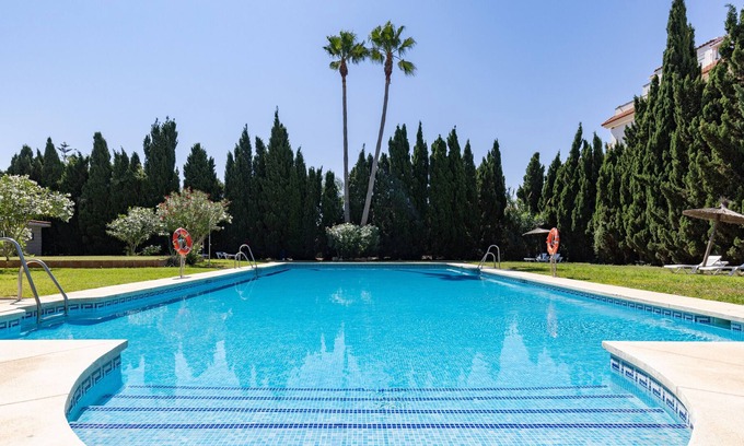 San Luis de Sabinillas Apartment | Apartment "Antonio Gala" with Sea View, Shared Pool & Wi-Fi