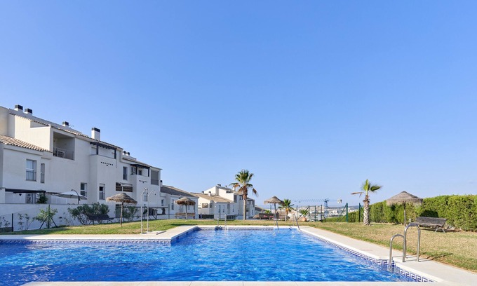 Caleta de Velez Apartment | Apartment 'Apartamento Baviera Golf 002' with Sea View, Shared Pool and Private Terrace