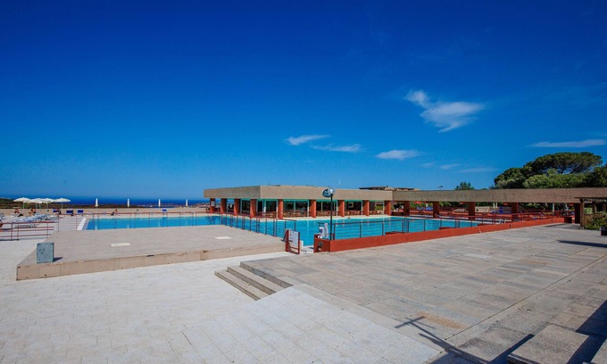 Cugnana Verde Apartment | Apartment "Asfodeli Cugnana Verde" with Sea View, Shared Pool & Wi-Fi
