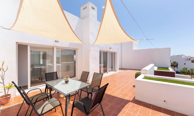 Retamar Apartment | Apartment 'Ático Nuevo Con Piscina' with Sea View, Shared Pool and Air Conditioning