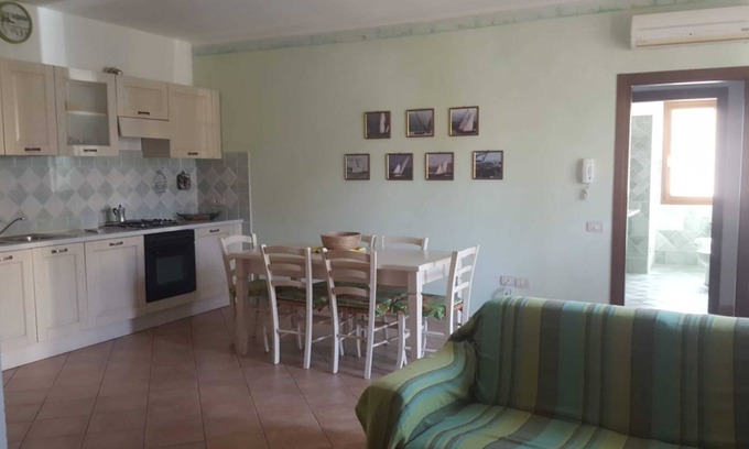 La Maddalena Apartment | Apartment "Cavalluccio 2 La Maddalena " with Shared Terrace, Wi-Fi & A/C