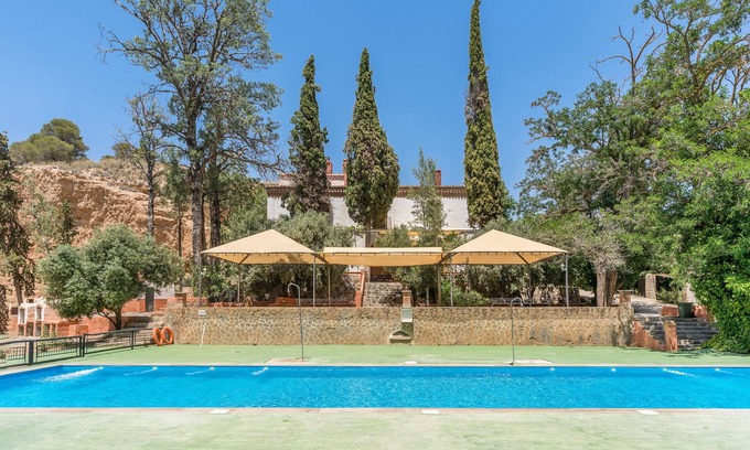Guadix Apartment | Apartment 'Cueva Mar' with Mountain View, Shared Pool and Wi-Fi