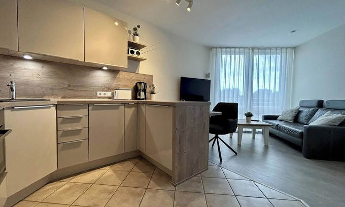 Duhnen Apartment | Apartment directly behind the dike for 2 persons, swimming pool, whirlpool, sauna