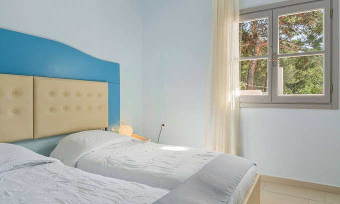 Massouri Apartment | Apartment 'Ermis Side Sea View' with Shared Garden, Wi-Fi and Air Conditioning