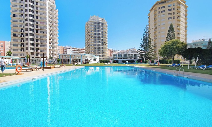 Armacao de Pera Apartment | Apartment Estrela 606 - Vista Mar on the Beach with Sea View, Pool, Wi-Fi, Garden & Balcony