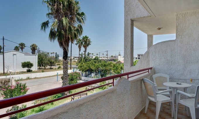 Tingaki Apartment | Apartment 'Golden Sun Two-bedroom Apt 1' with Sea View, Shared Pool and Wi-Fi