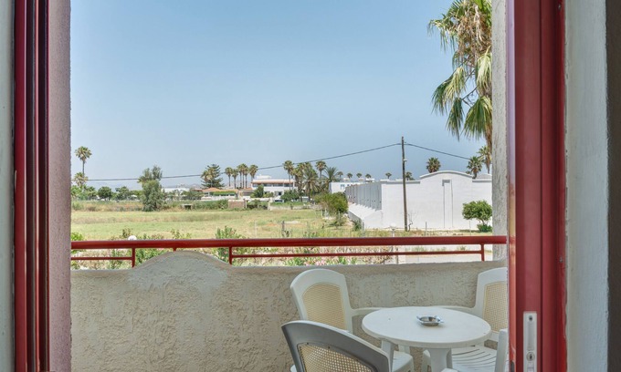 Tingaki Apartment | Apartment 'Golden Sun Two-bedroom Apt 2' with Sea View, Shared Pool and Wi-Fi