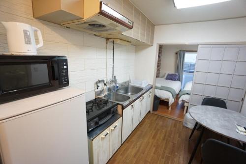 Nanbasennichimae Apartment | Apartment House Sanyo Green Heights 505