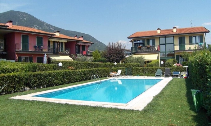 Caprino Veronese Apartment | Apartment in residence with swimming pool. Private garden